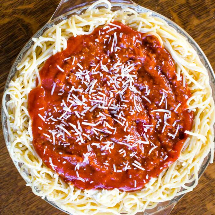 sauce layer before baking spaghetti pie