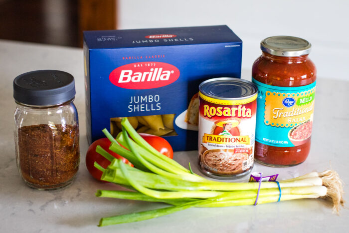 ingredients for taco stuffed shells on countertop