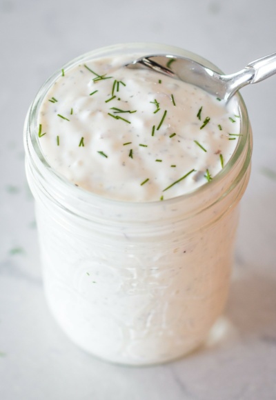 tarter sauce in pint sized jar with spoon