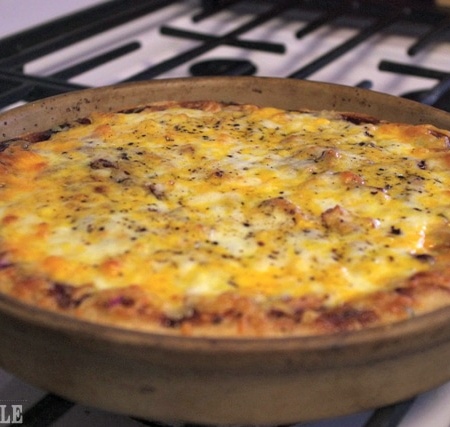 barbecue pizza baked on oven top