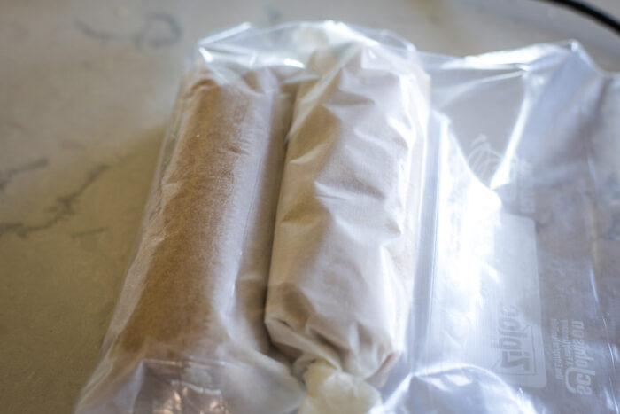 dough logs in wax paper to refrigerate