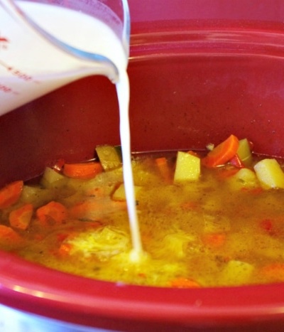 Adding cream to potato soup
