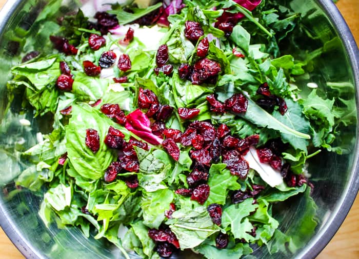 dried cranberries and arugula in orzo salad