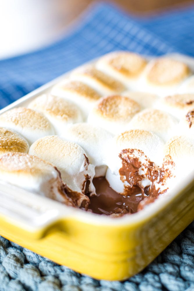 baking dish with smores dip and melted chocolate