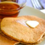 healthy oatmeal pancakes on plate with butter