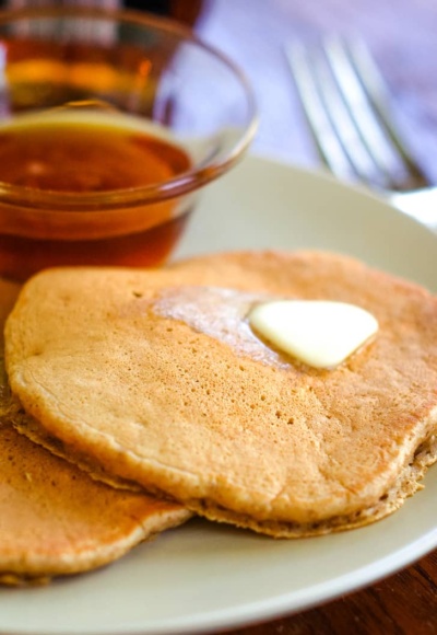healthy oatmeal pancakes on plate with butter