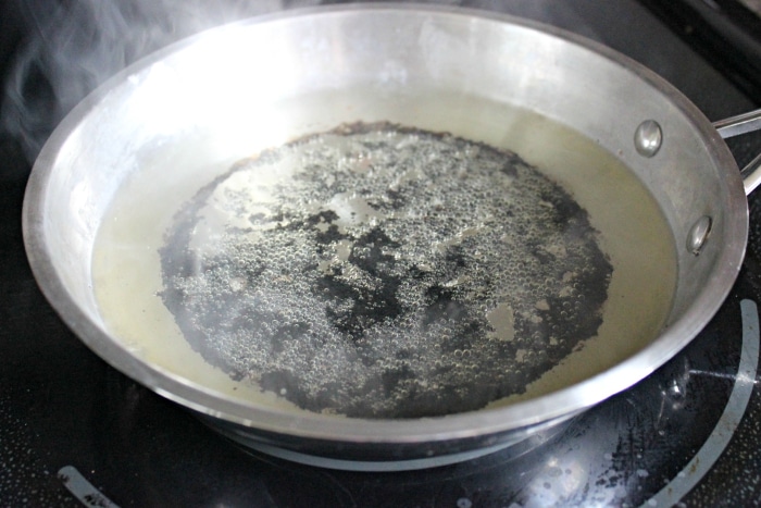 Boiling water on stove to get rid of burnt
