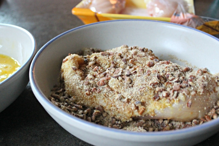 How to bread chicken with pecans and bread crumbs for Bourbon Pecan Chicken recipe.
