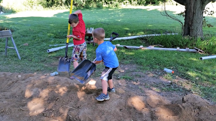 boys-digging-holes