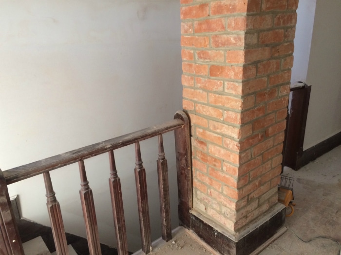farmhouse-renovation-week-16-chimney-upstairs-hallway
