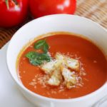 Creamy tomato soup topped with homemade croutons