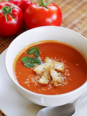 Creamy tomato soup topped with homemade croutons
