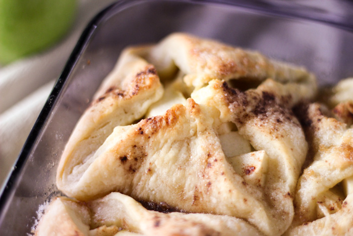 close up of apple dumpling baked in pan