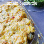 cheesy potato casserole with sliced potatoes and side dish