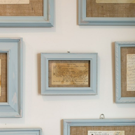 framed recipe cards on wall