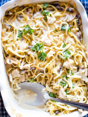 chicken tetrazzini in baking dish with spoon