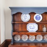 plate hutch painted with blue chalk paint and antique plates