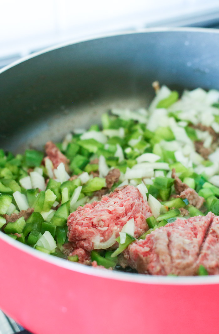 ground beef onion and green pepper in skillet to cook