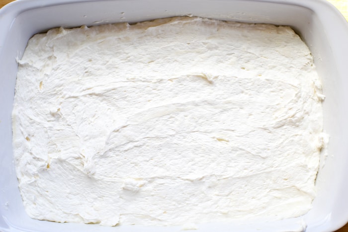cream cheese and powdered sugar layer lemon lush