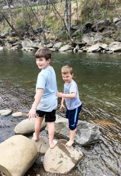 Two boys in creek at Gatlinburg