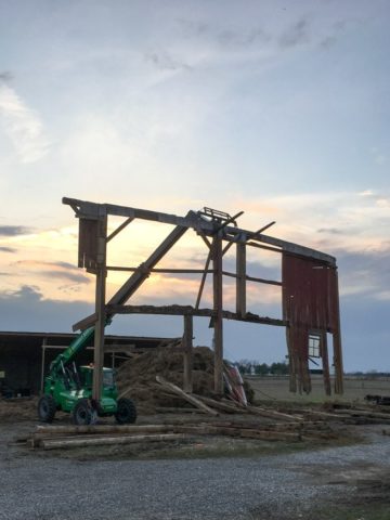barn piece being removed