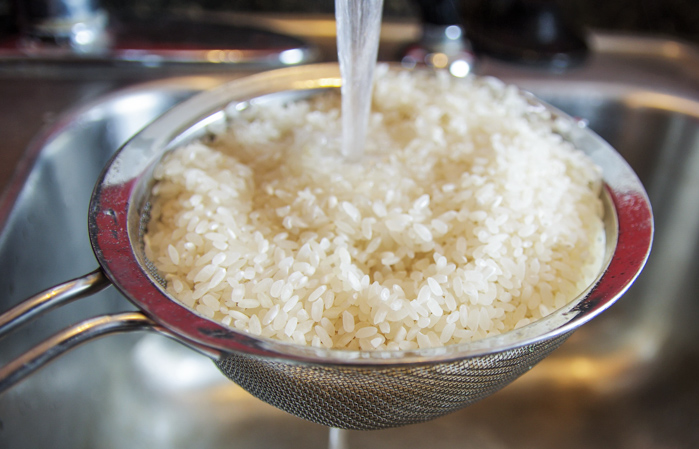 draining rice with water for instant pot