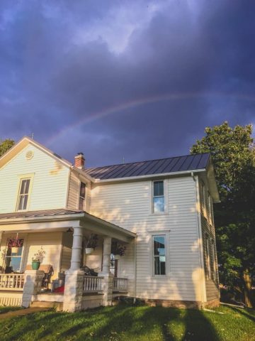 farmhouse in Ohio with rainbow