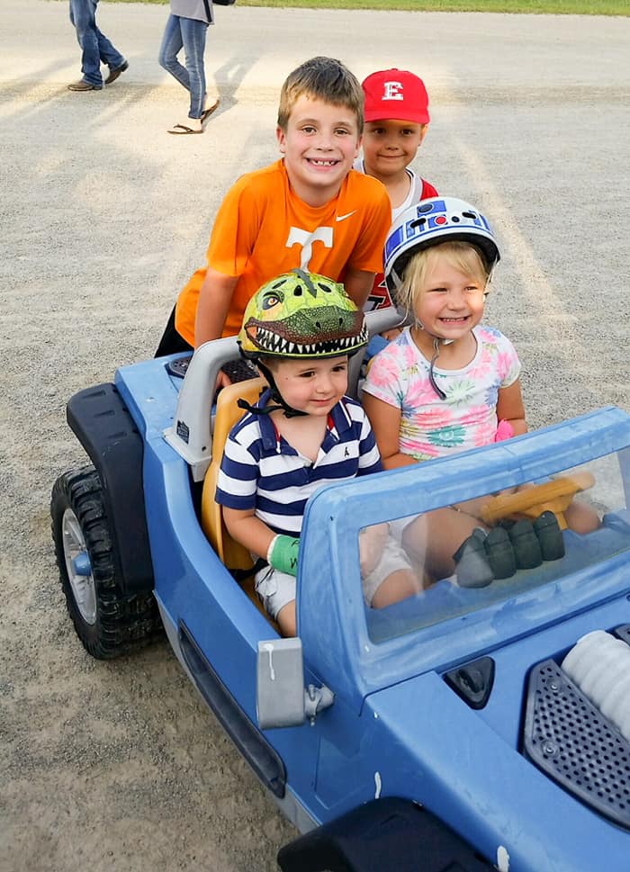 kids on toy car