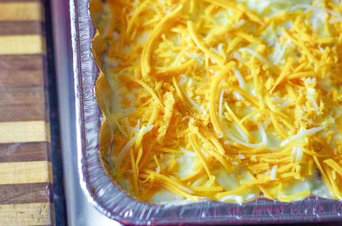 shredded cheese on top of ground venison recipe