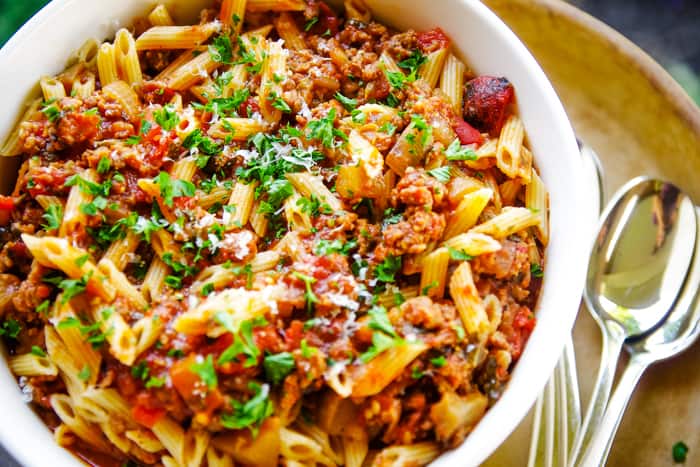slow cooker eggplant pasta with sausage in bowl