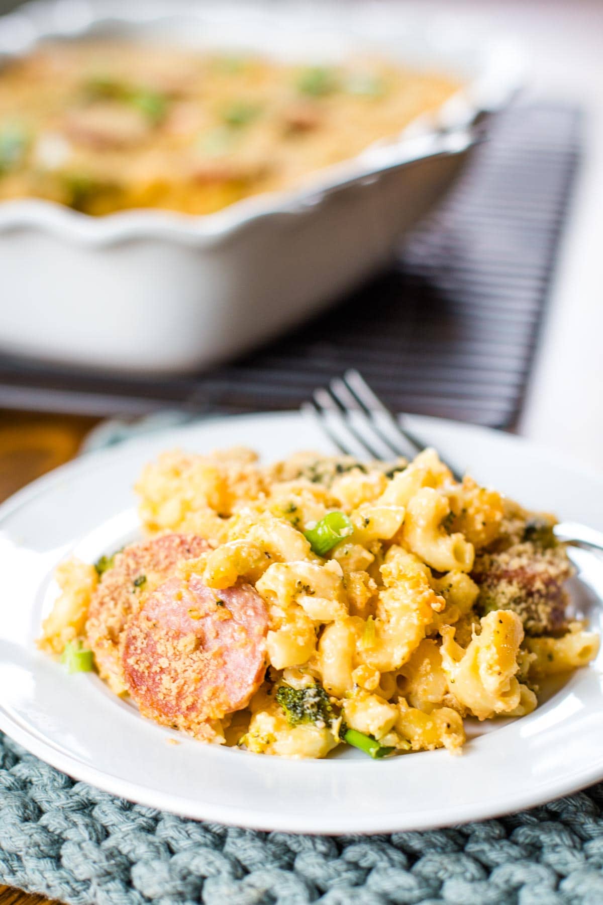 macaroni casserole serving on plate with fork