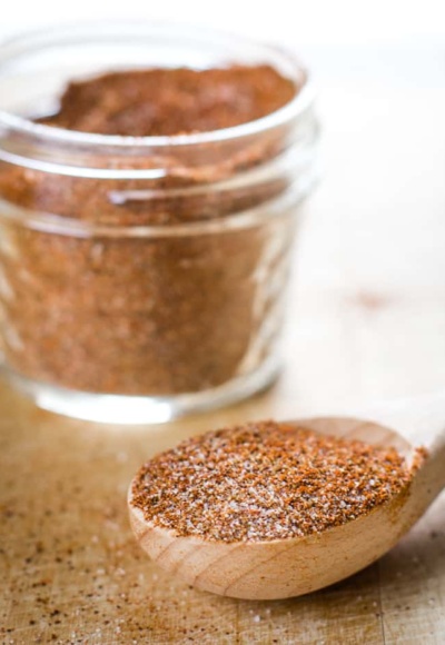 homemade chili seasoning in jar with tablespoon