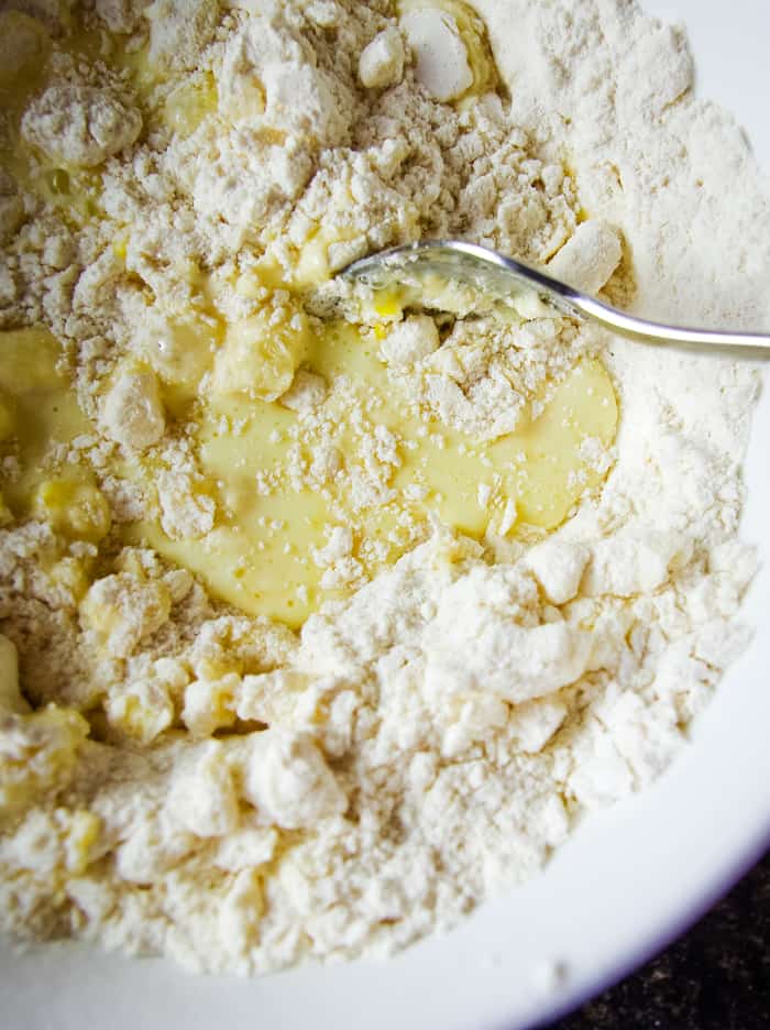 dry and wet lemon pie ingredients in bowl