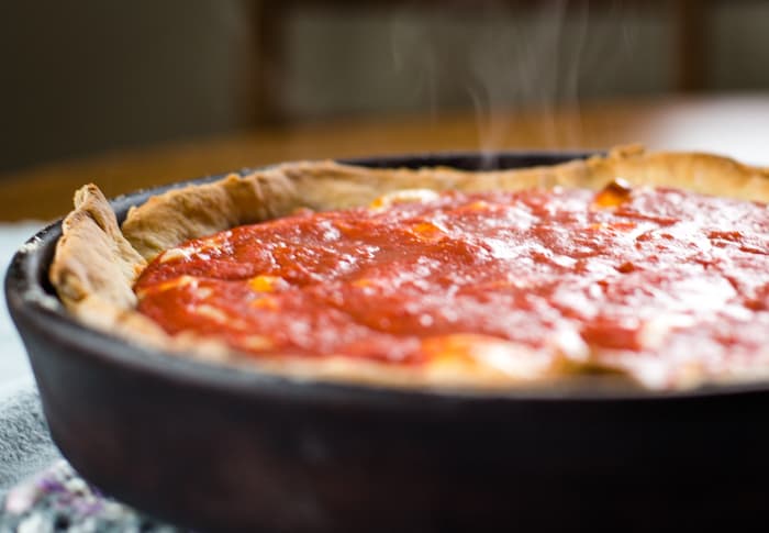 deep dish pizza out of the oven