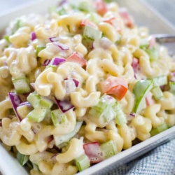 simple macaroni salad in bowl with spoon