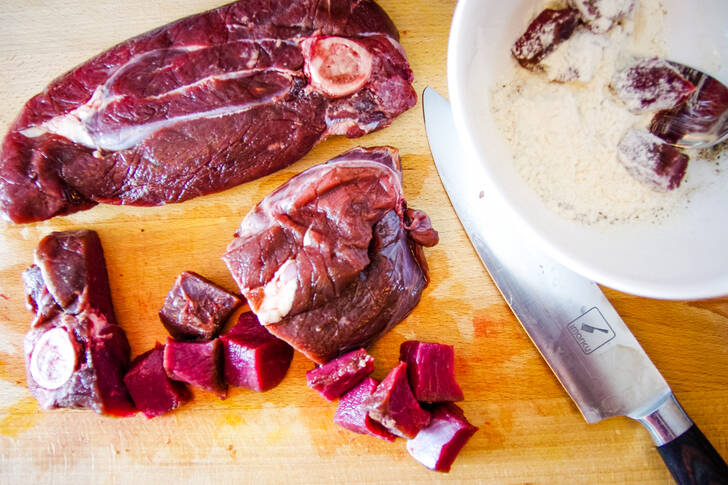 venison steak on cutting board
