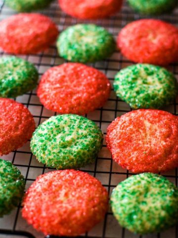 Christmas cookies in red and green on cooling rack