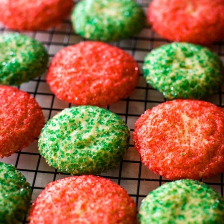 Christmas cookies in red and green on cooling rack