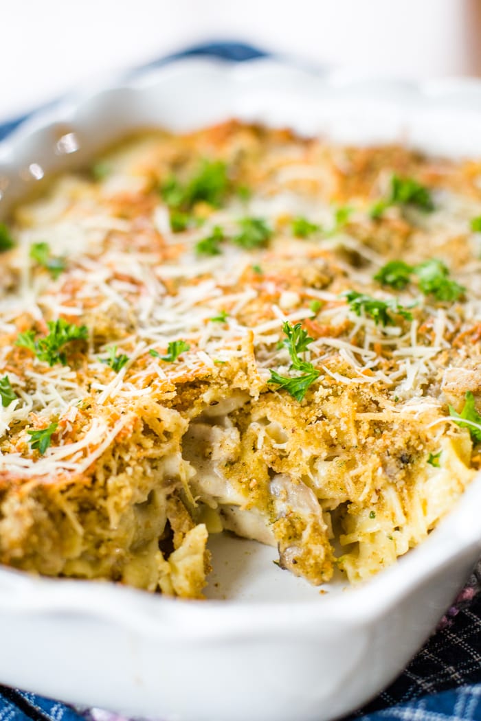 turkey noodle casserole in pan with slice