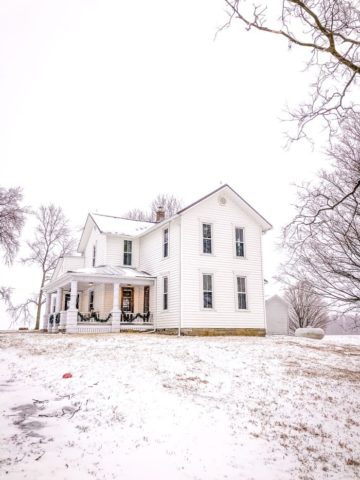 farmhouse in snow