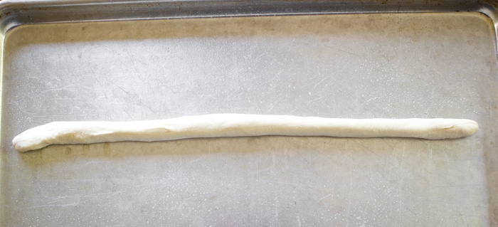 dough rope to form pretzel