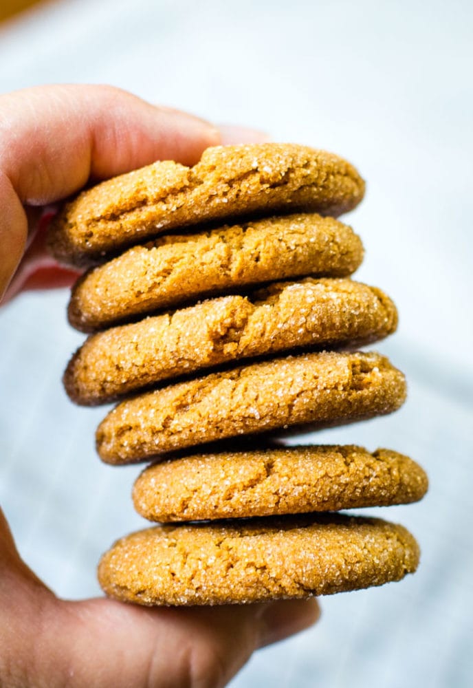 stack of ginger snaps in hand