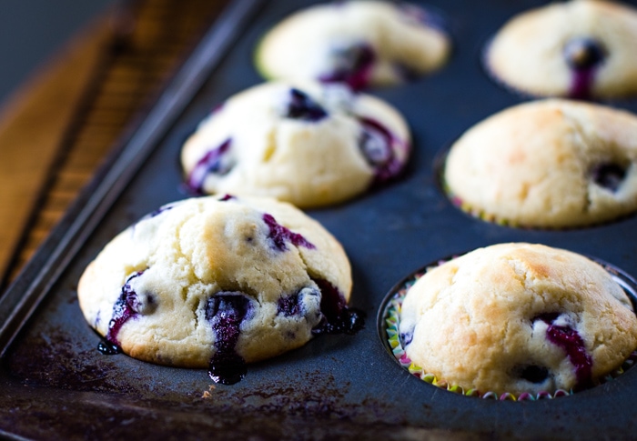 blueberry muffins in muffin pan baked