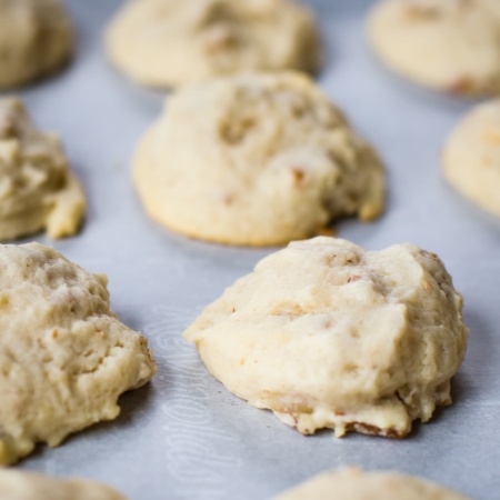 cream cheese cookies on parchment paper