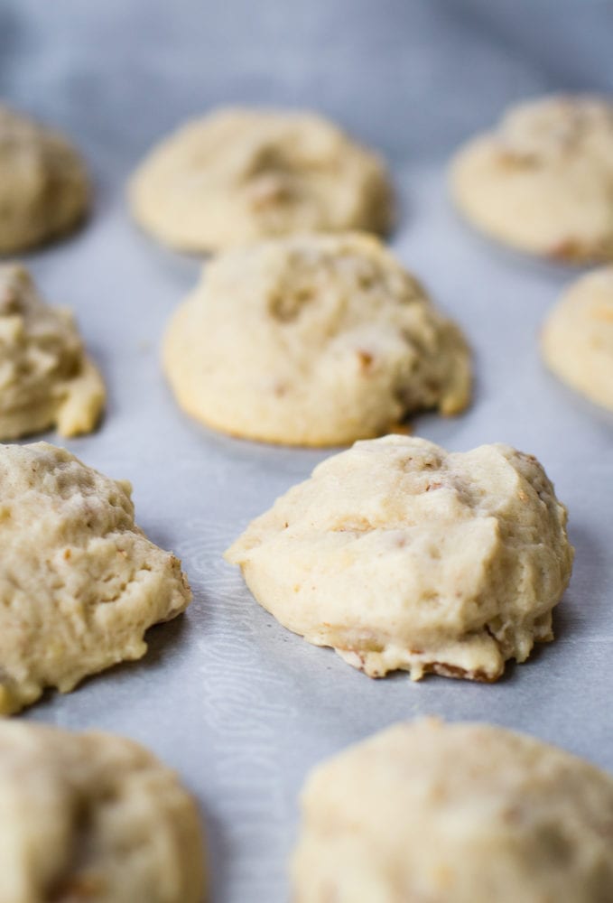 cream cheese cookies on parchment paper