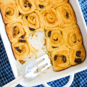 danish rolls in baking dish with serving spatula