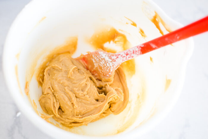 peanut butter filling mixed in bowl with spatula