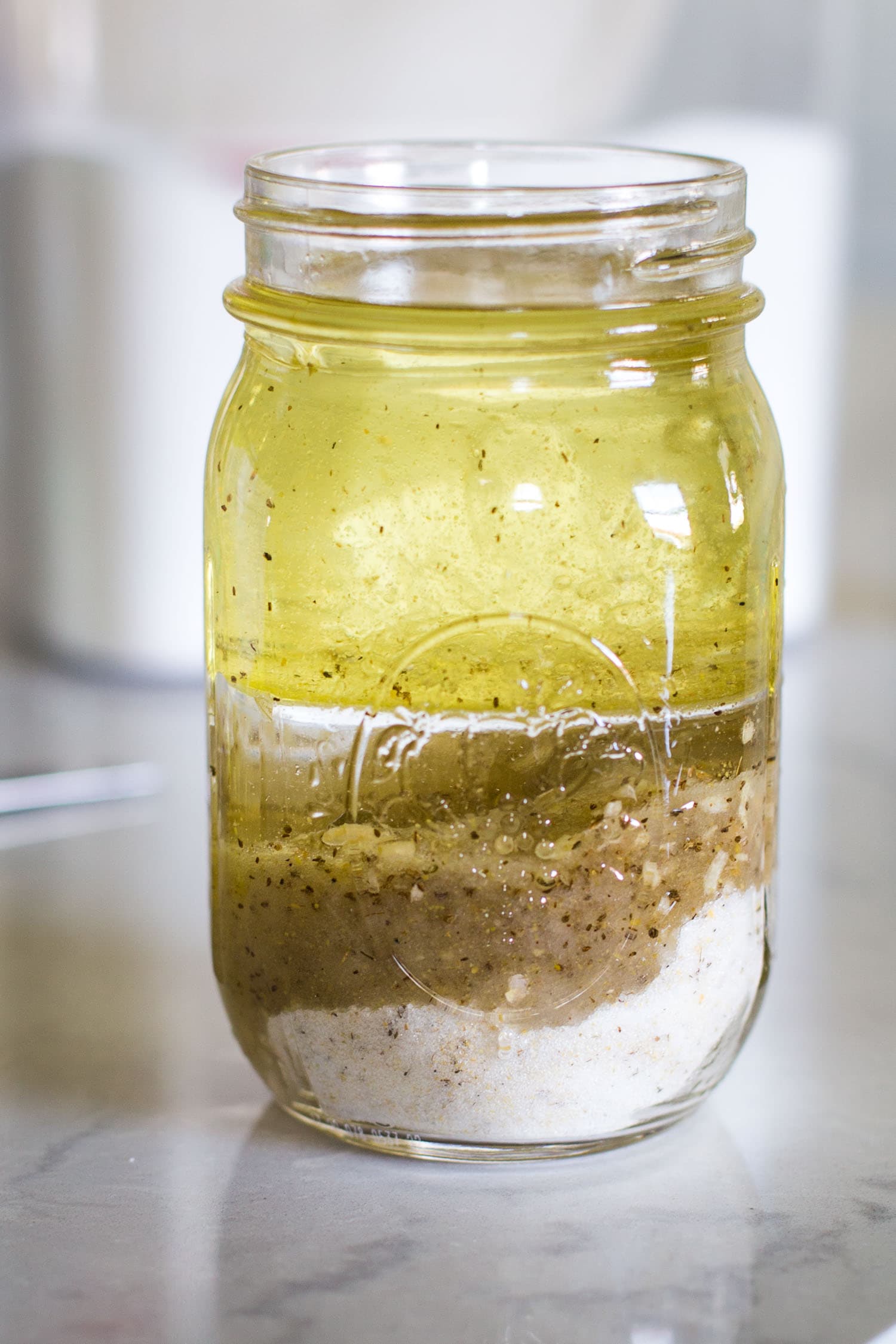 layers of ingredients in pint sized jar