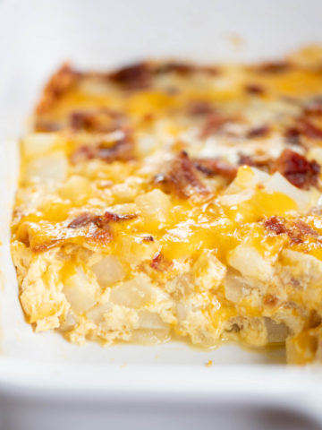 slice out of bacon potato casserole in baking dish