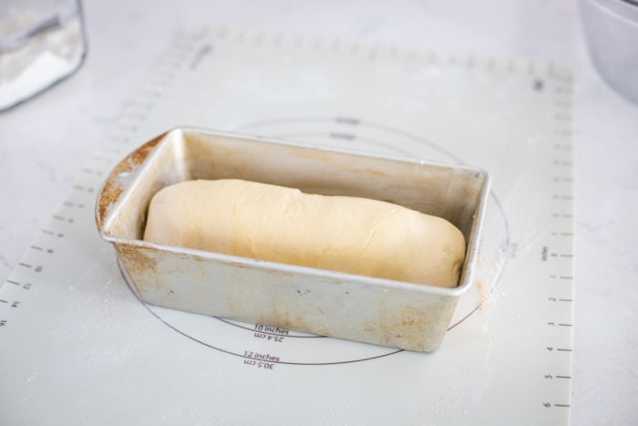 rolled dough in bread loaf pan